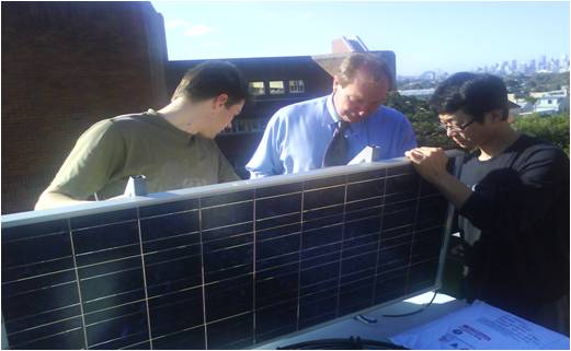 My dad, Tom and I working on our solar panel My dad, Tom and I working on our solar panel